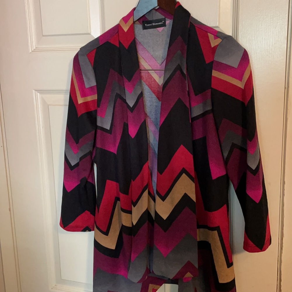 Multi colored lightweight sweater, size small polyester/spandex made USA